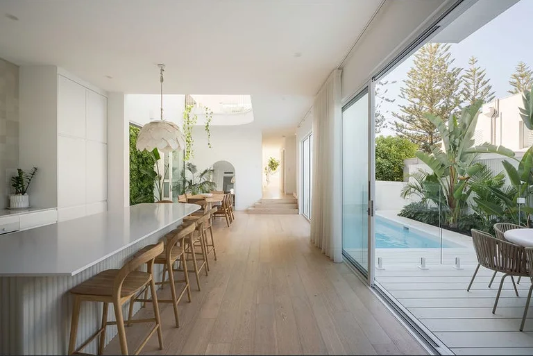 Open-plan kitchen and living opening to the pool terrace, Swanbourne project
